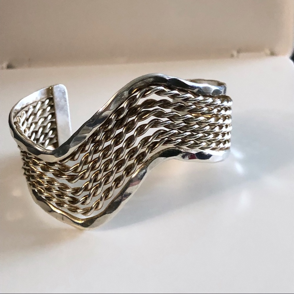 Silver tone wavy cuff bracelet